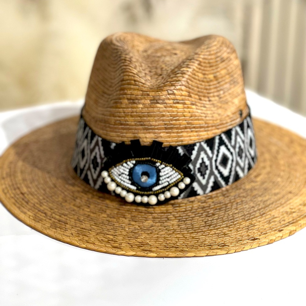 Palm leaf straw hat .